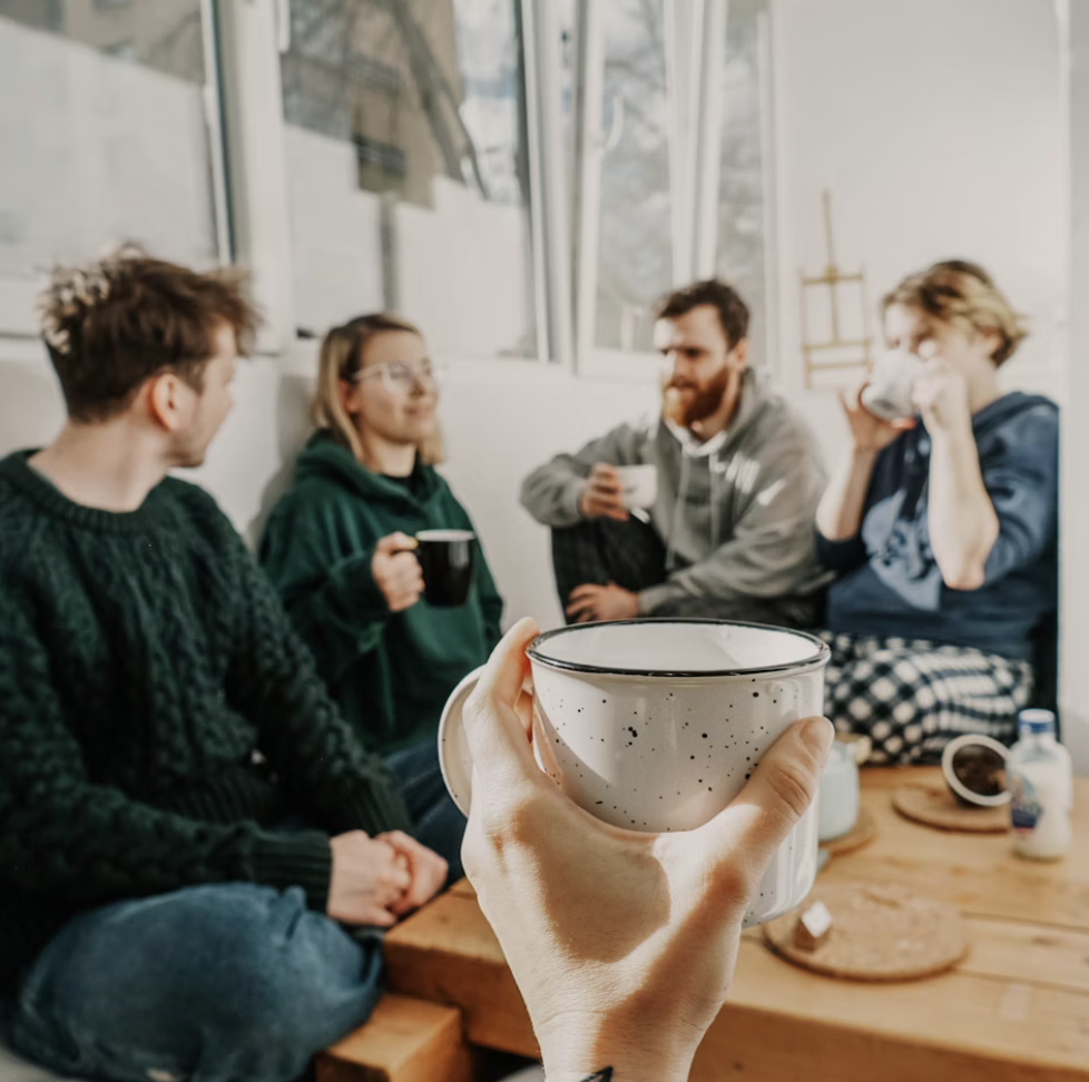People discussing over coffee